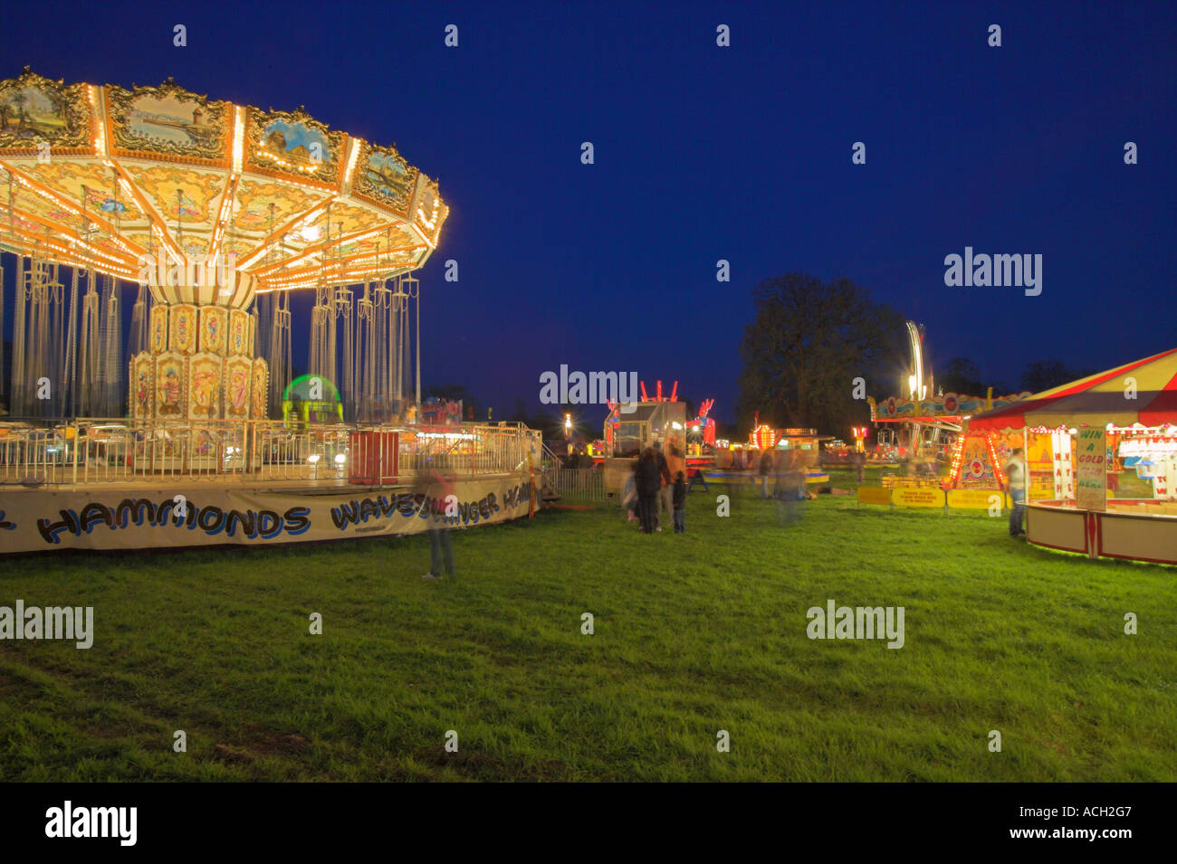 Fairground scene time exposure after sundown Stock Photo Alamy