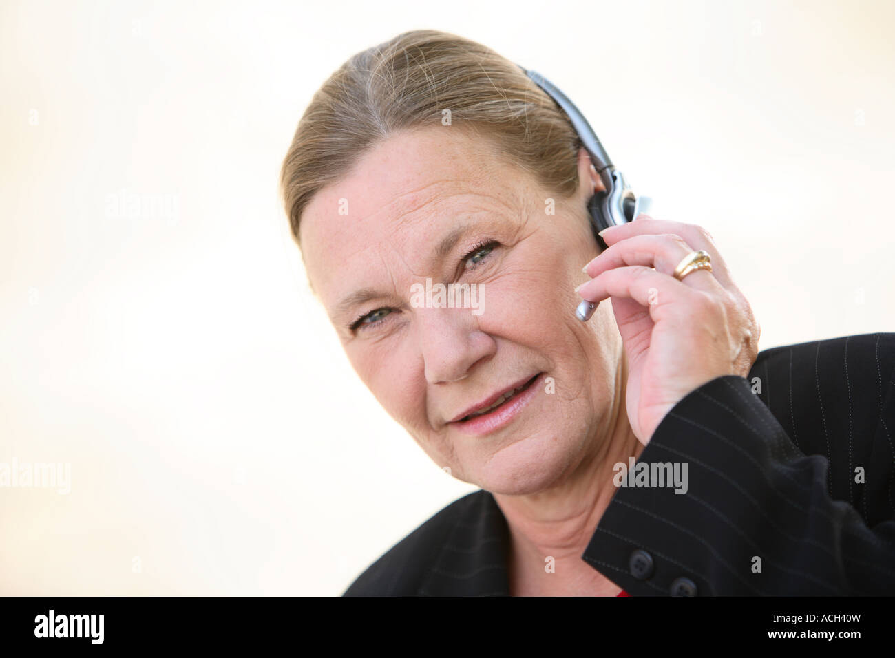 Businesswoman with headset Stock Photo