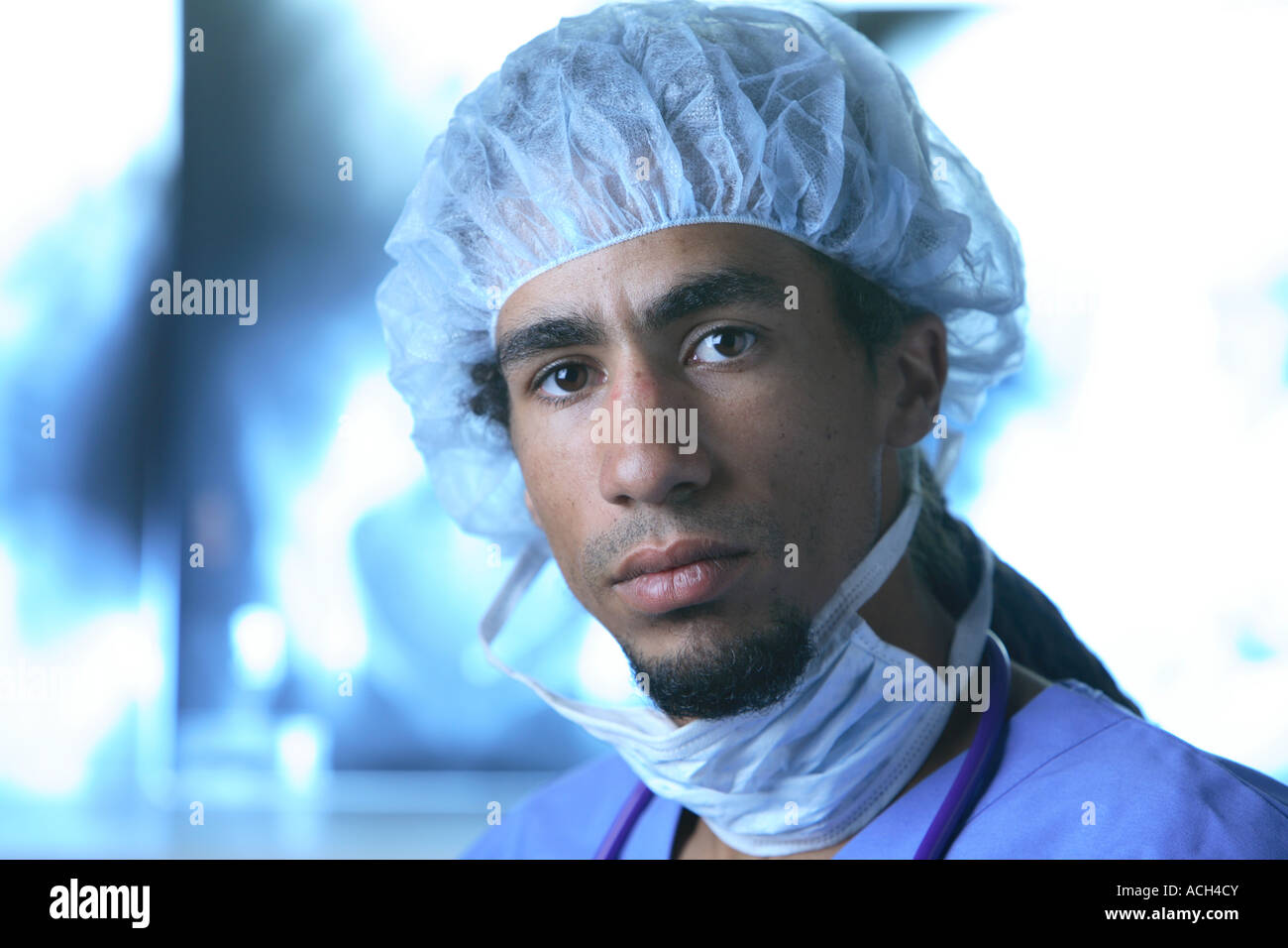 Portrait of young doctor in scrubs Stock Photo