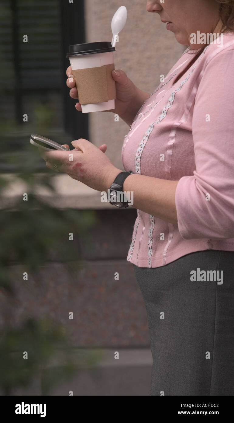 woman holding mobile phone Stock Photo