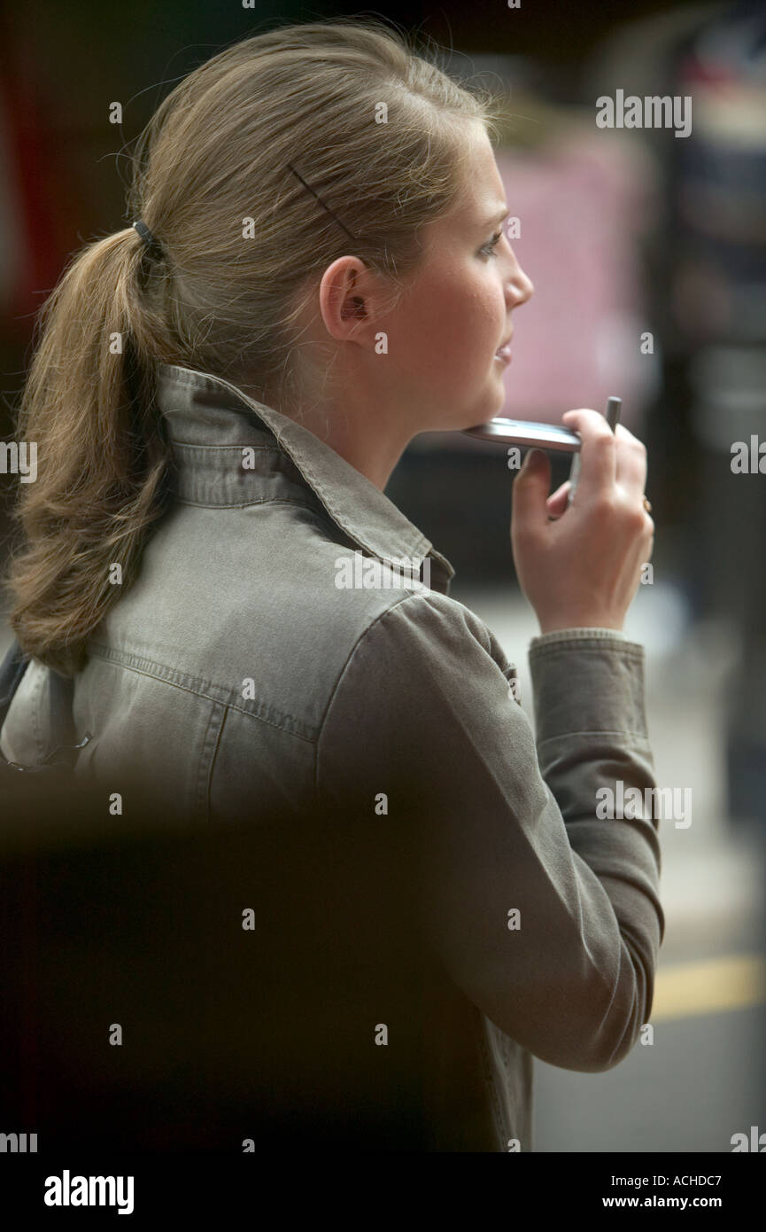 woman holding mobile phone Stock Photo