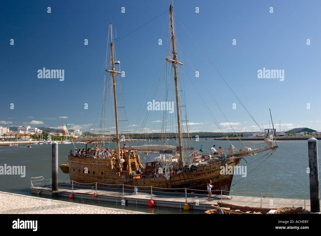 Old fashioned sailing boat preparing to sail. Algarve, Portugal Stock