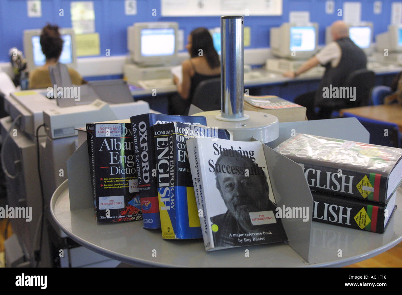 Dictionaries on shelf in college library north London GB UK Stock Photo
