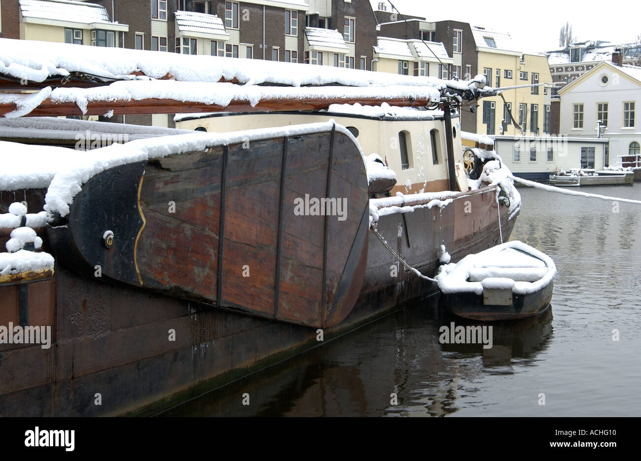Boat on Dutch canal in the winter Stock Photo