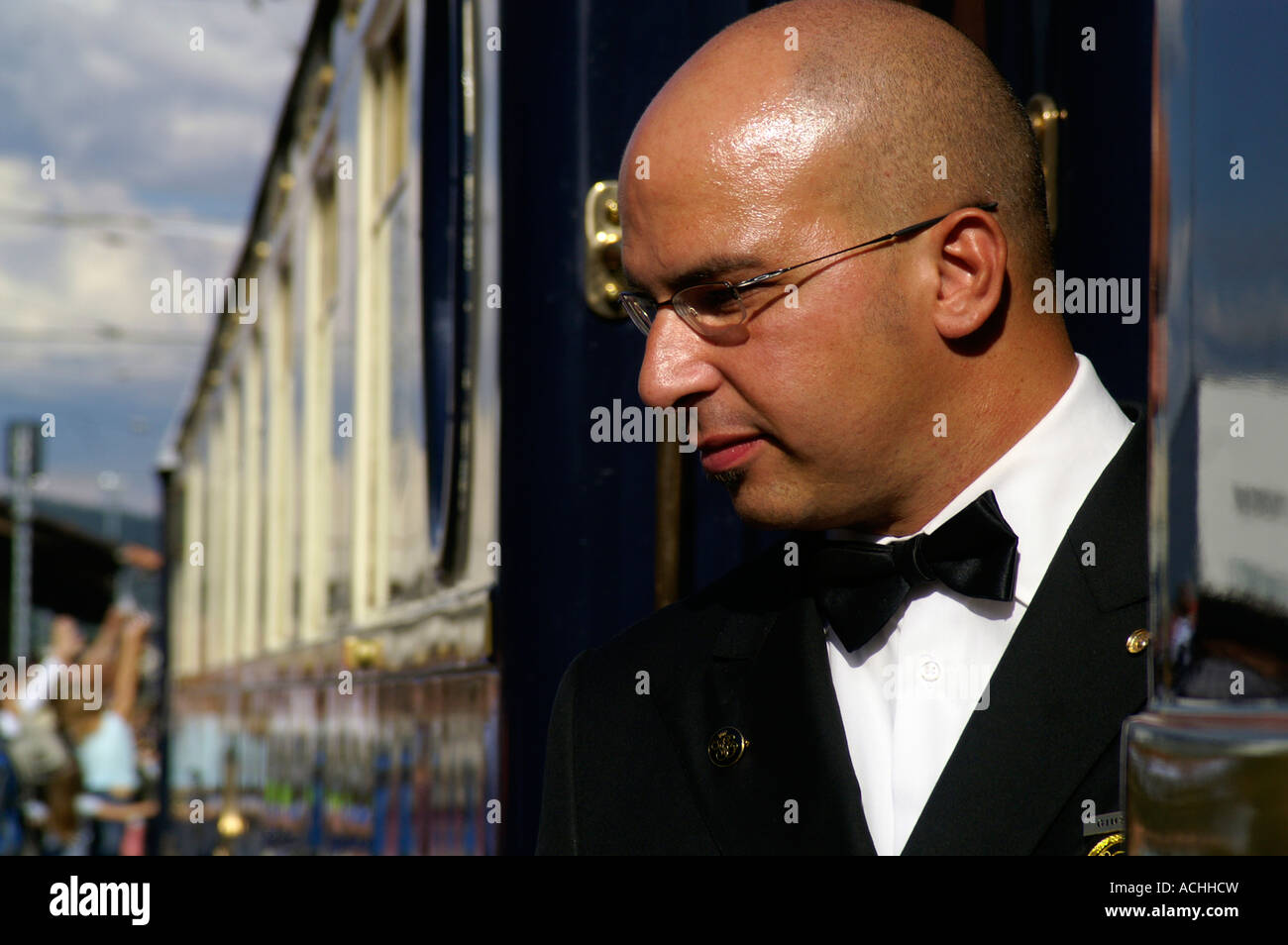 Orient Express luxury train and uniformed steward Stock Photo