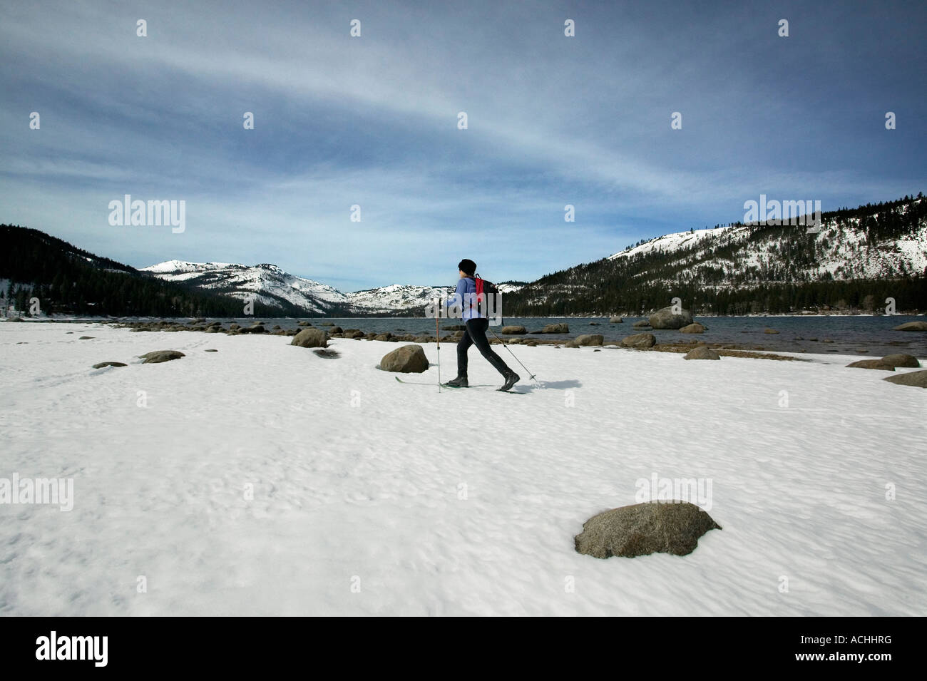 Cross country skier on the shore of Donner Lake, Truckee Califoria