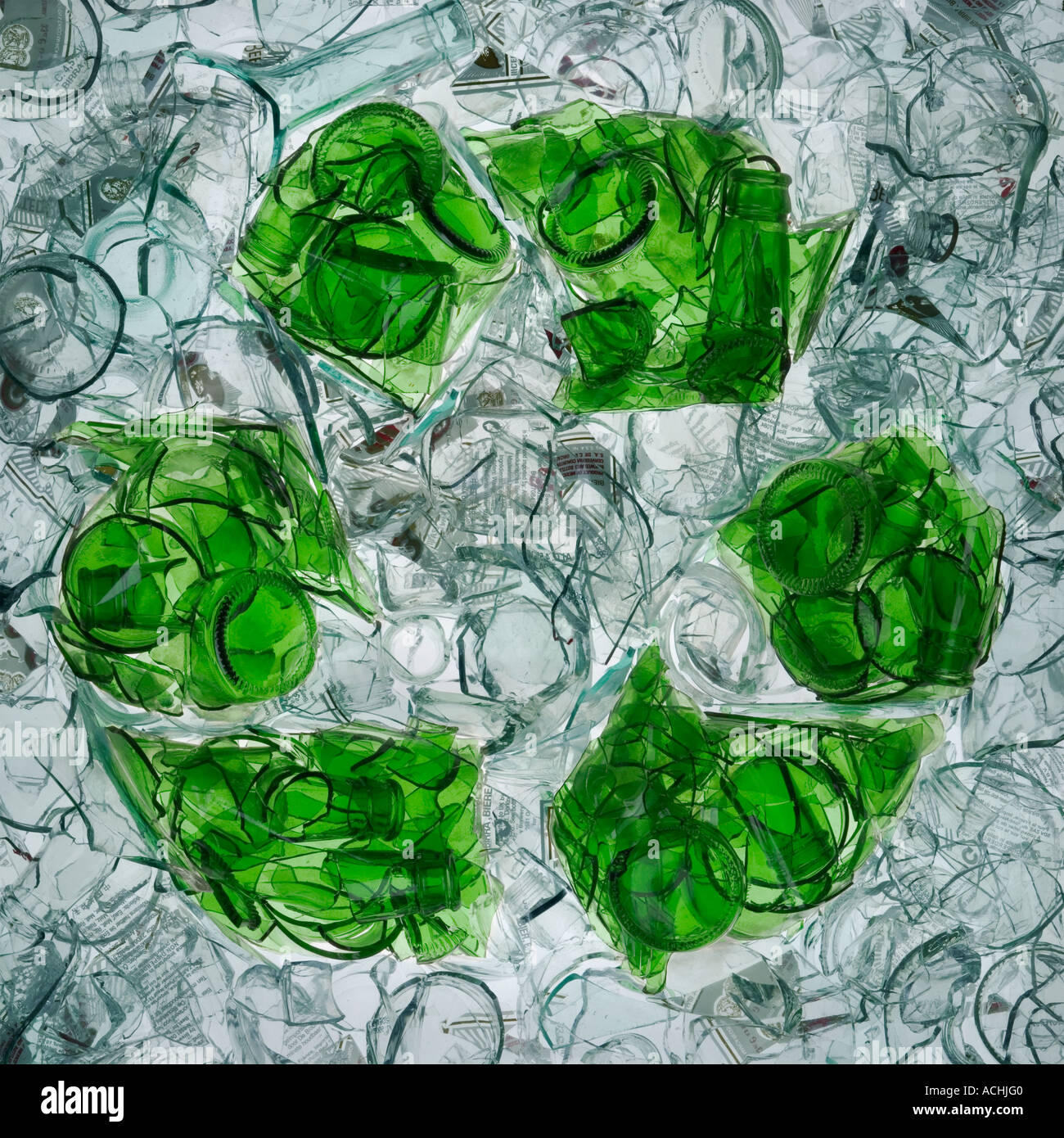 Artistic shot of a recycling symbol made entirely from broken glass