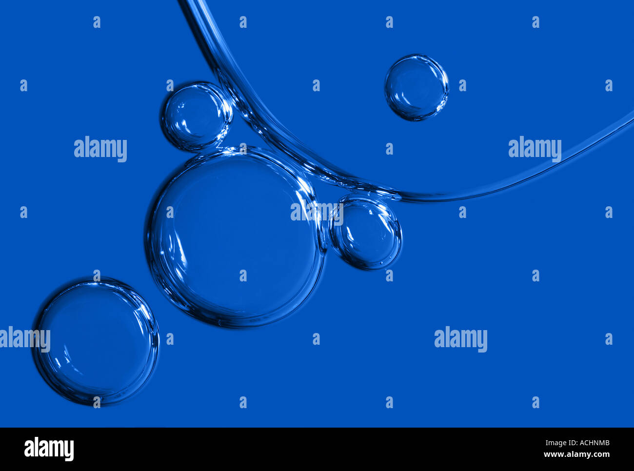 Air bubbles in blue oil Stock Photo