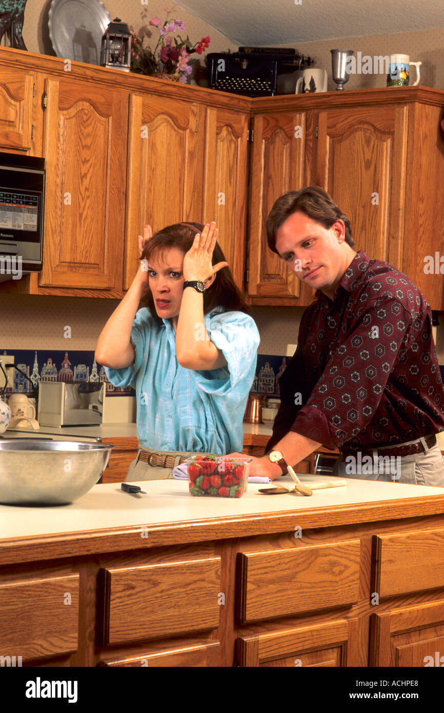 Couple arguing in the kitchen Stock Photo