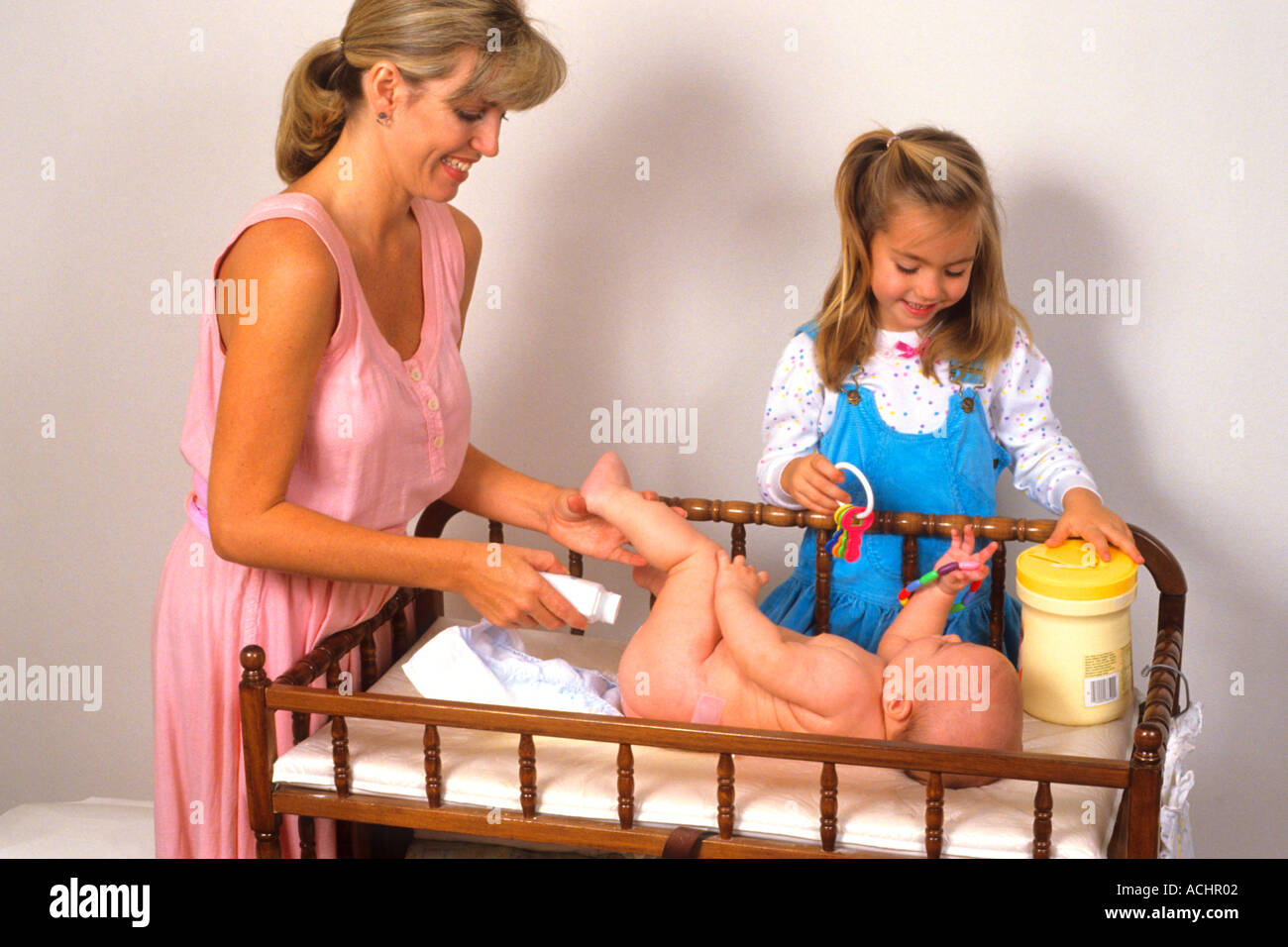 daghter diaper Mother and daughter change newborns diapers Stock Photo - Alamy