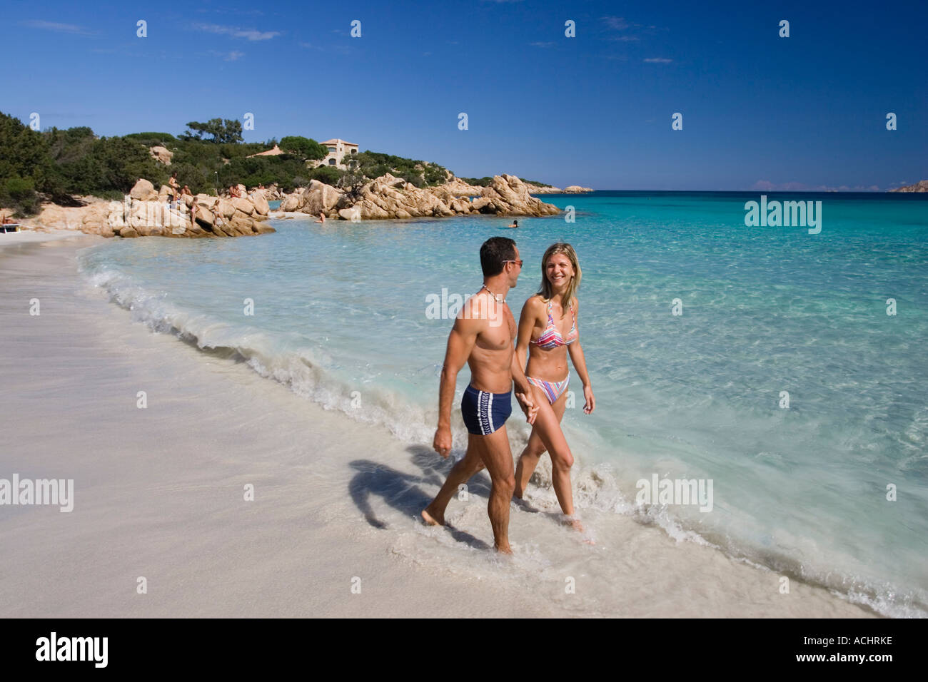 Couple Spiaggia Capriccioli Costa Smeralda Sardinia Italy Stock Photo