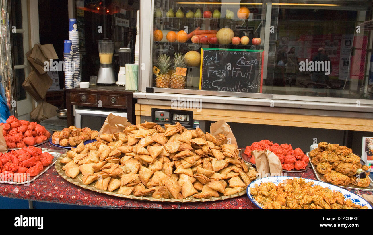 Indian food displayed outside a restaurant, Brick Lane, London Stock Photo