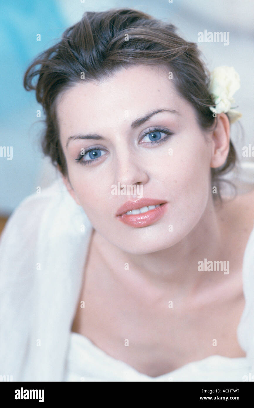 Portrait woman smiling flower in her hair Stock Photo - Alamy