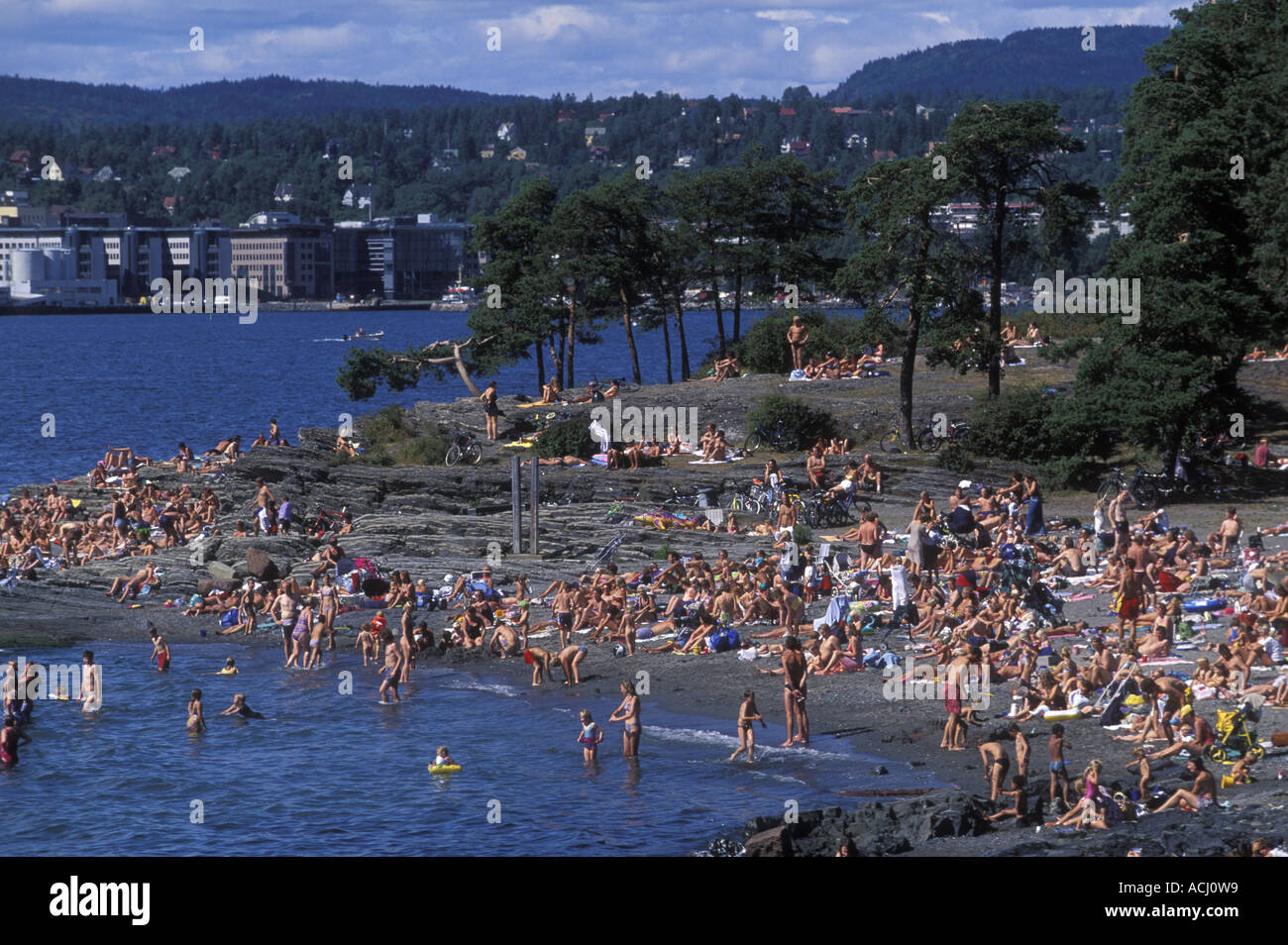 Europe Norway Beach crowded with sunbathers on Bygdy Peninsula near ...