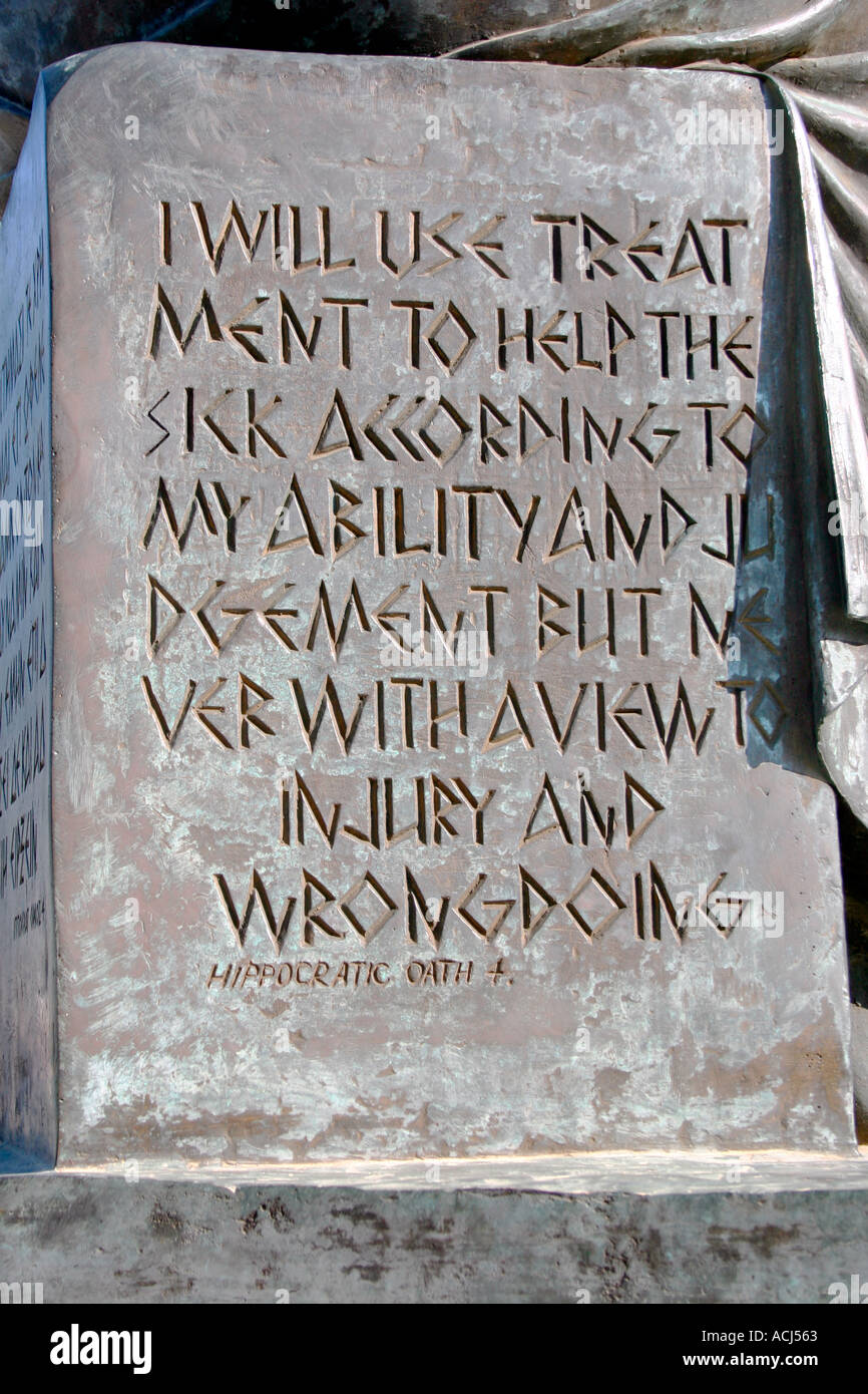 The Hippocratic oath, carved into the base of the statue of Hippocrates, in Kos town on the Greek island of Kos. Stock Photo