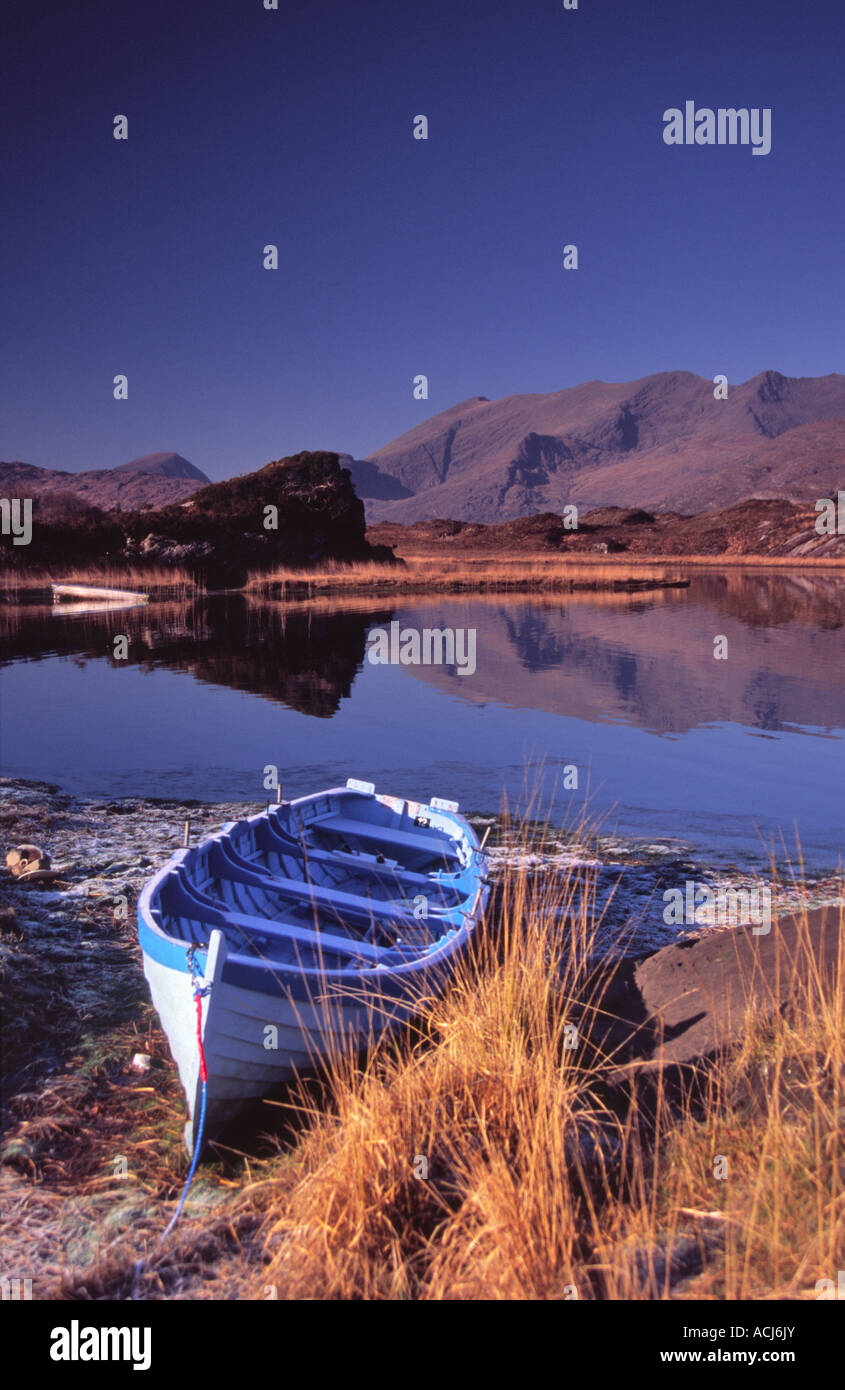 Winter morning fishing boat beside Upper Lough. Killarney Lakes, Killarney National Park, County Kerry, Ireland. Stock Photo