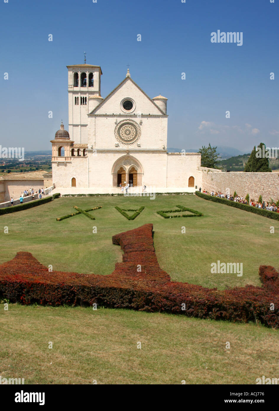 Basilica of Saint Francis and Tau symbol Assisi Umbria Italy Stock Photo