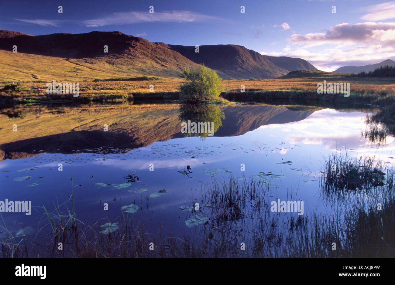 The Partry Mountains reflected in the Owenmore River, County Mayo, Ireland. Stock Photo