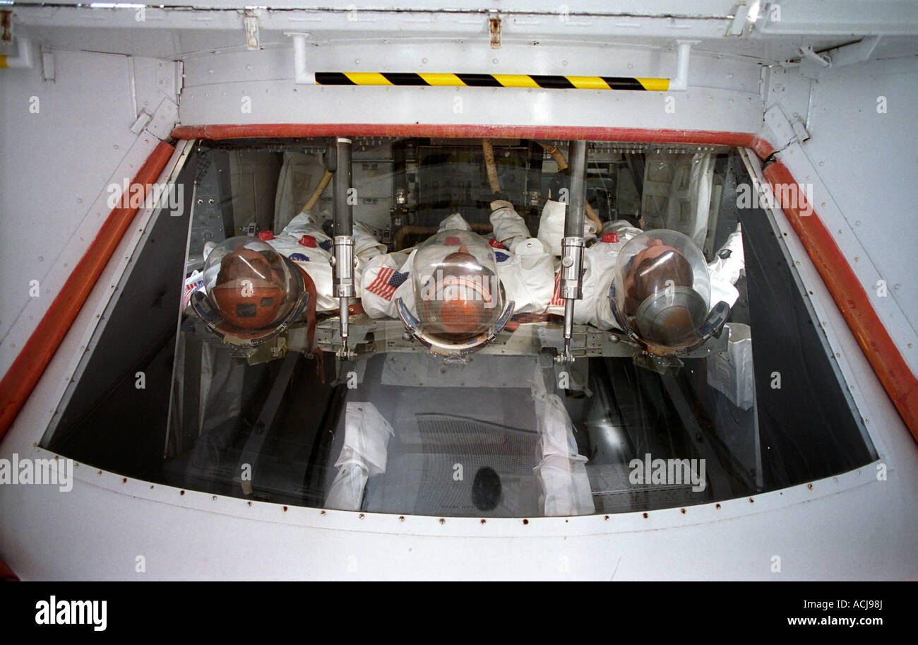 Spacemen manequins inside space capsule Stock Photo