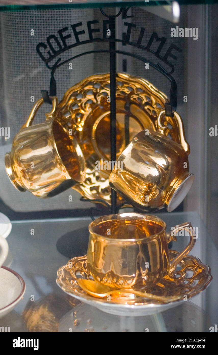Golden coffee cups Stock Photo Alamy
