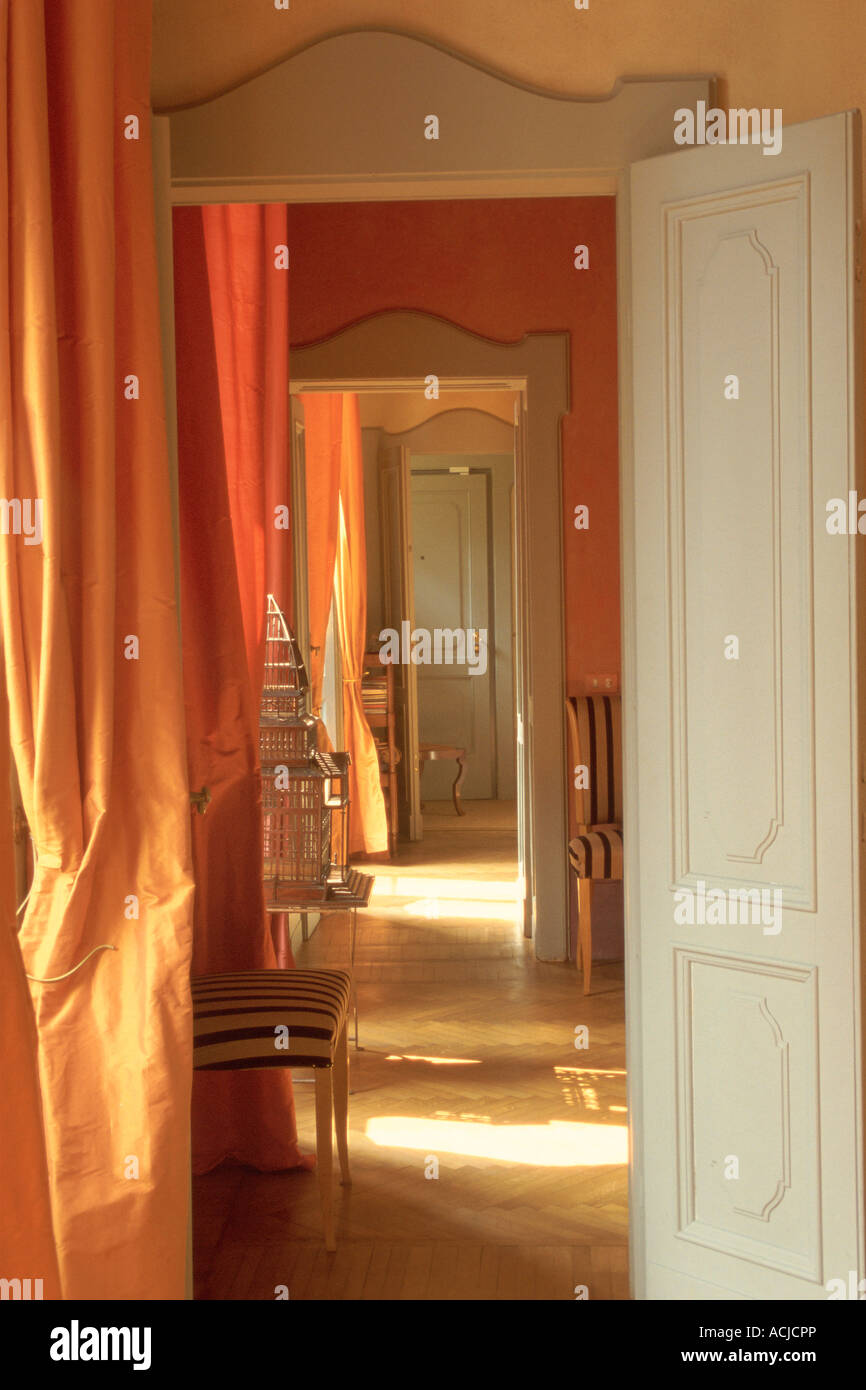 Doors open hall orange curtains Stock Photo - Alamy