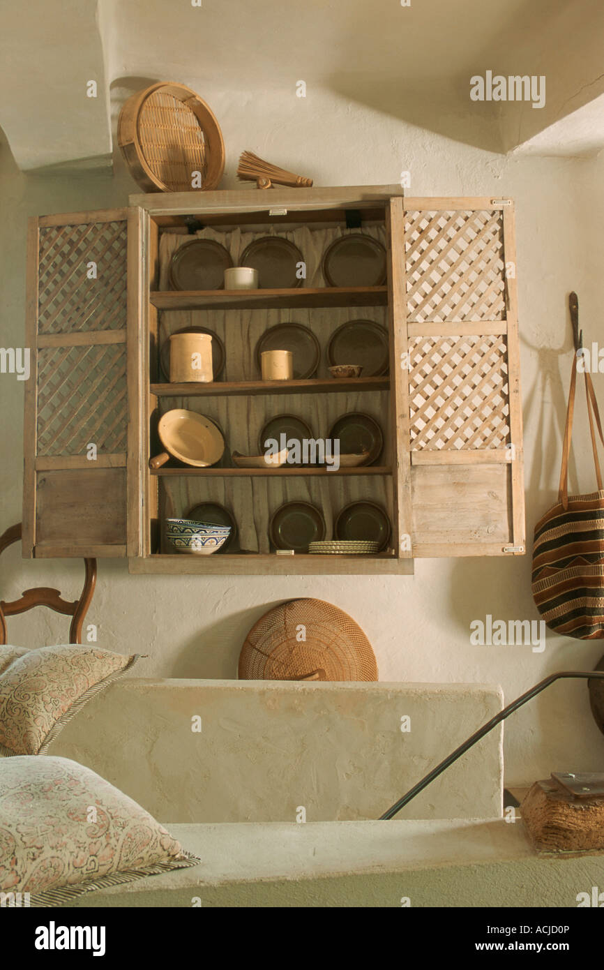 Close up On Crockery In Little Closet White Low Walls Stock Photo Alamy