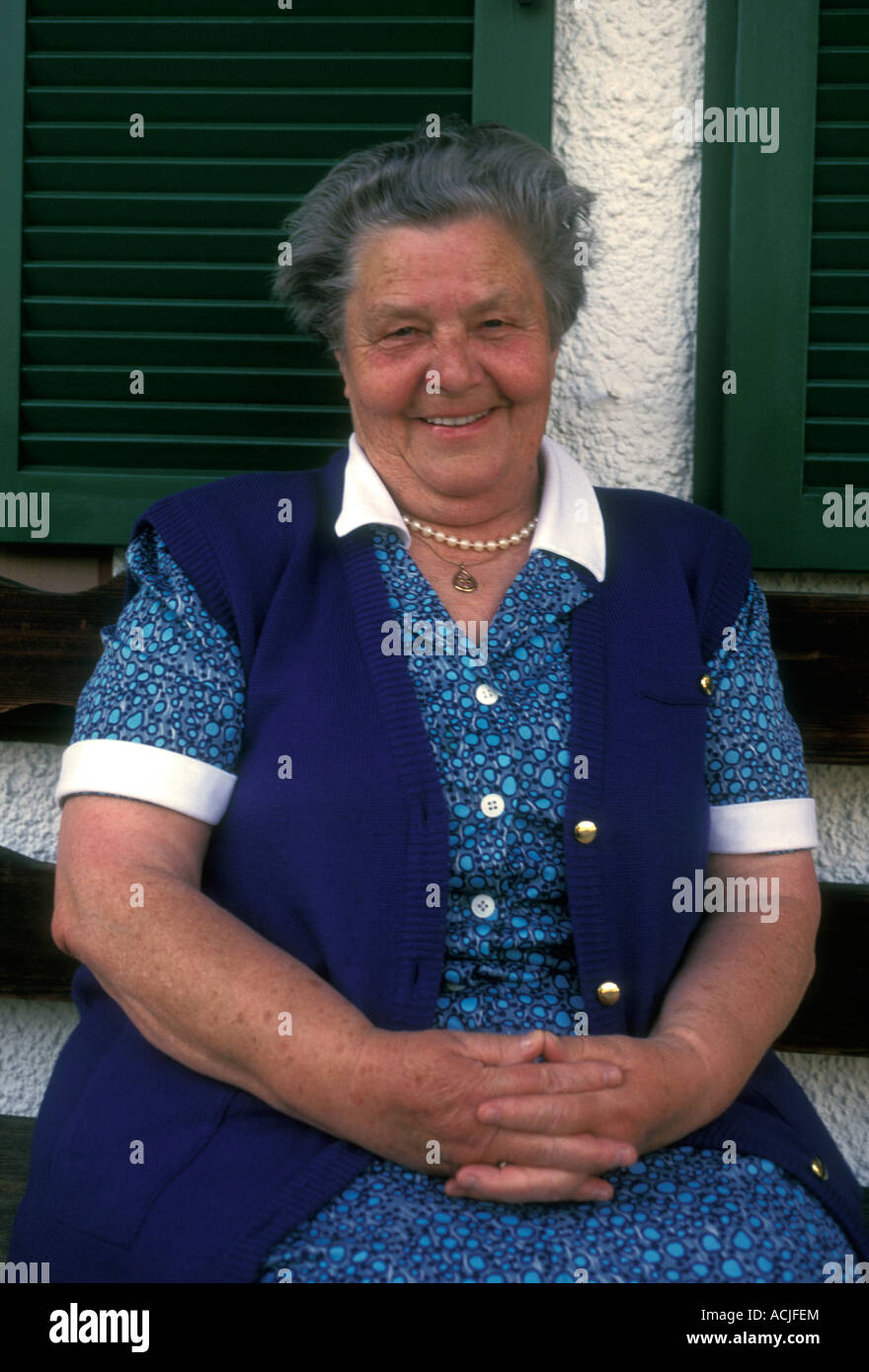 1 one German people person female adult elderly mature senior woman smiling town of Garmisch-Partenkirchen Bavaria Germany Stock Photo