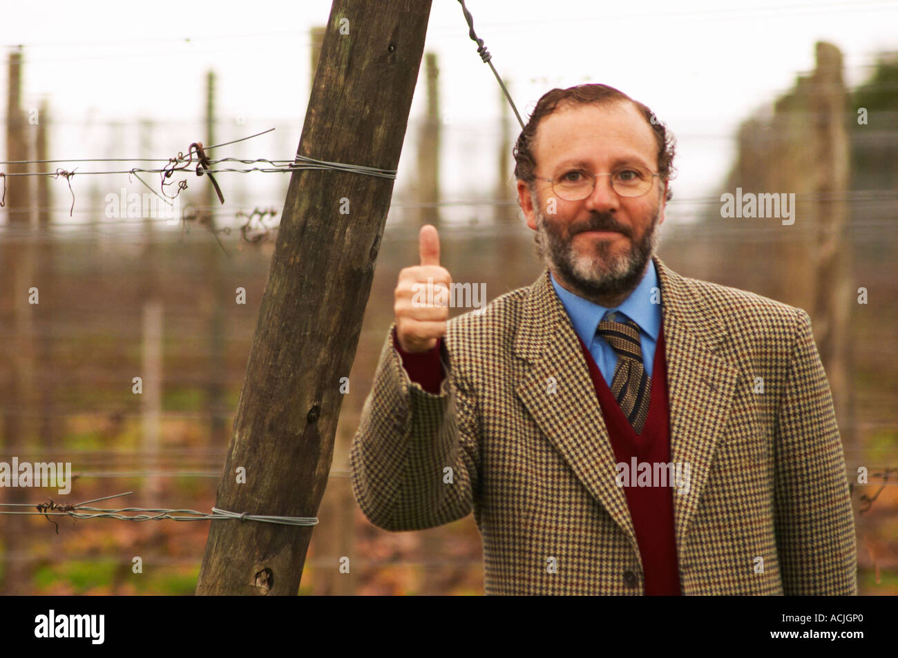 Juan Luis Bouza, owner in front of one of his Tannat vineyards. giving the thumbs up sign. Bodega Bouza Winery, Canelones, Montevideo, Uruguay, South America Stock Photo
