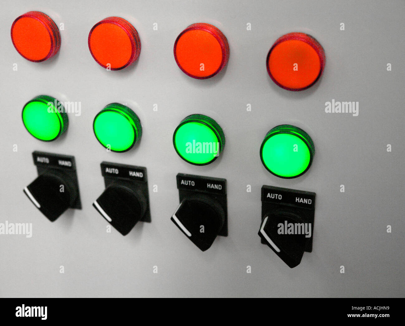 Computer room switch gear - electrical control panel with Red and Yellow lights and black switches Stock Photo