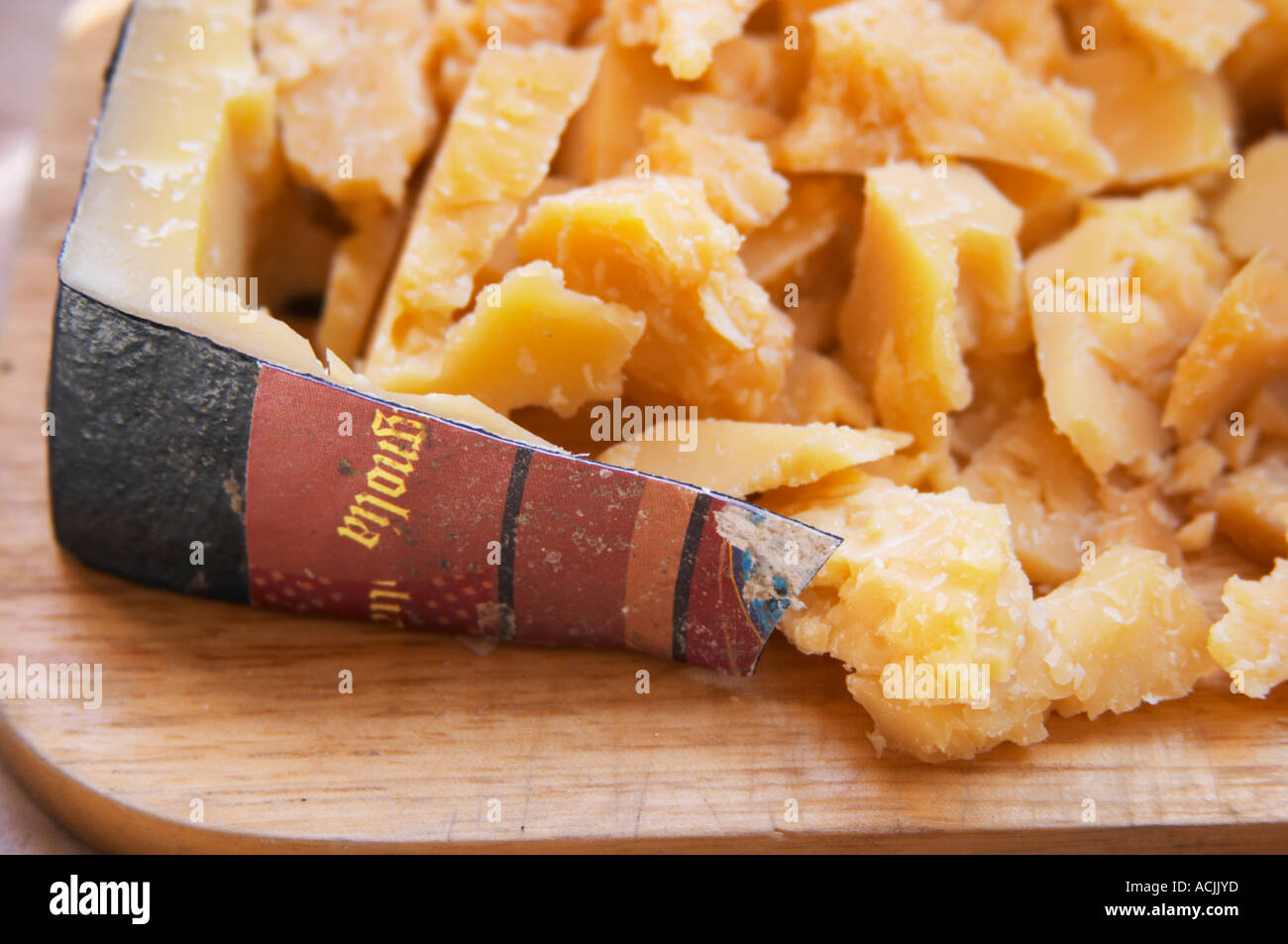 XXX Dry cheese similar to parmesan cut in small pieces ready to be tasted.  on a cutting board. Bodega Pisano Winery, Progreso, Uruguay, South America  Stock Photo - Alamy