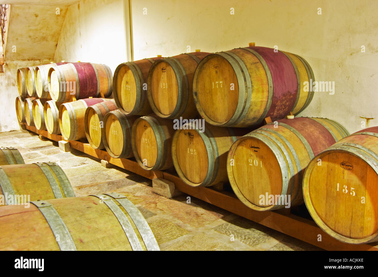 The barrel aging cellar with a few wooden barriques. Vinedos y Bodega