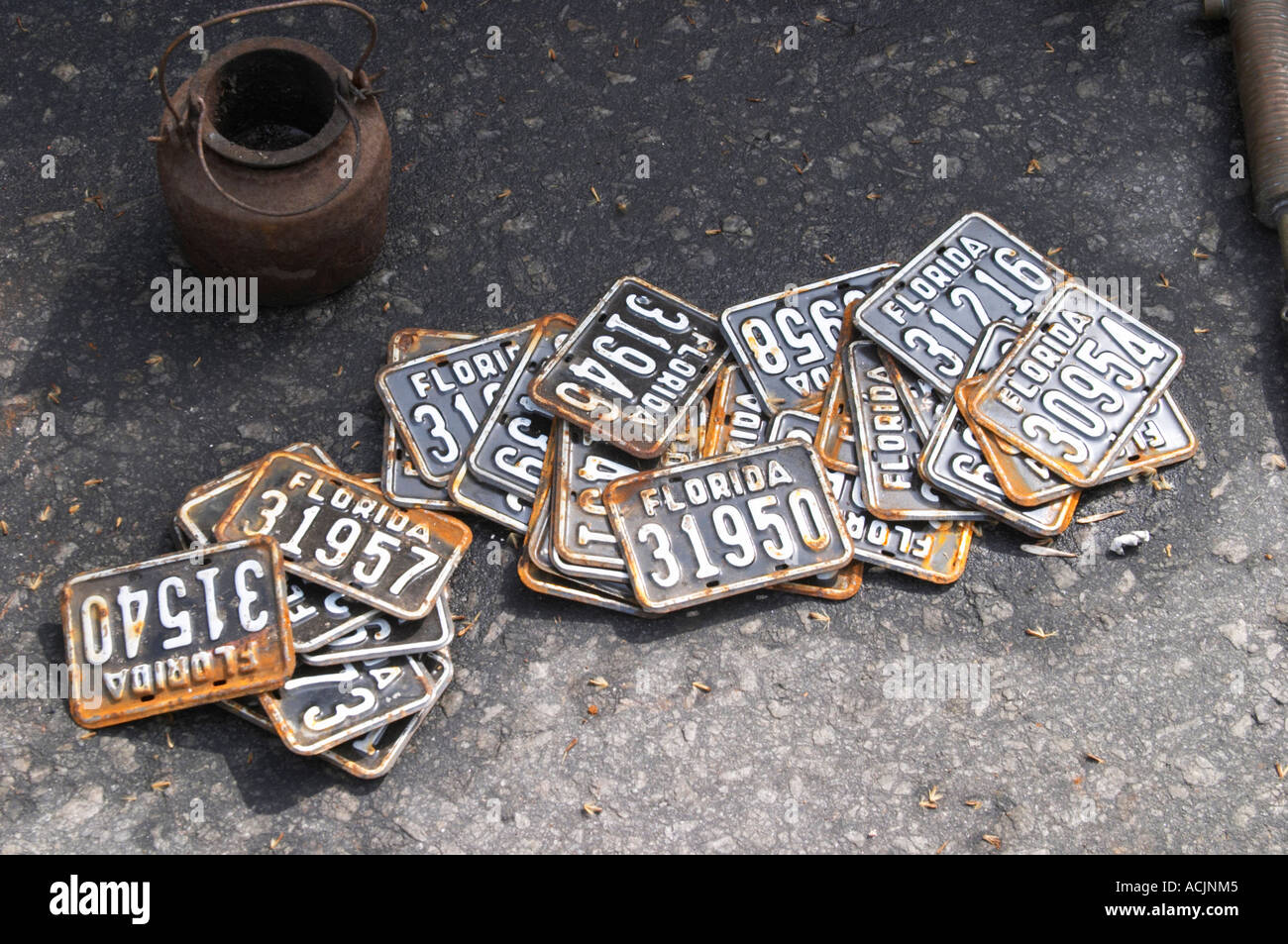A market stall street market merchant selling old car license plates