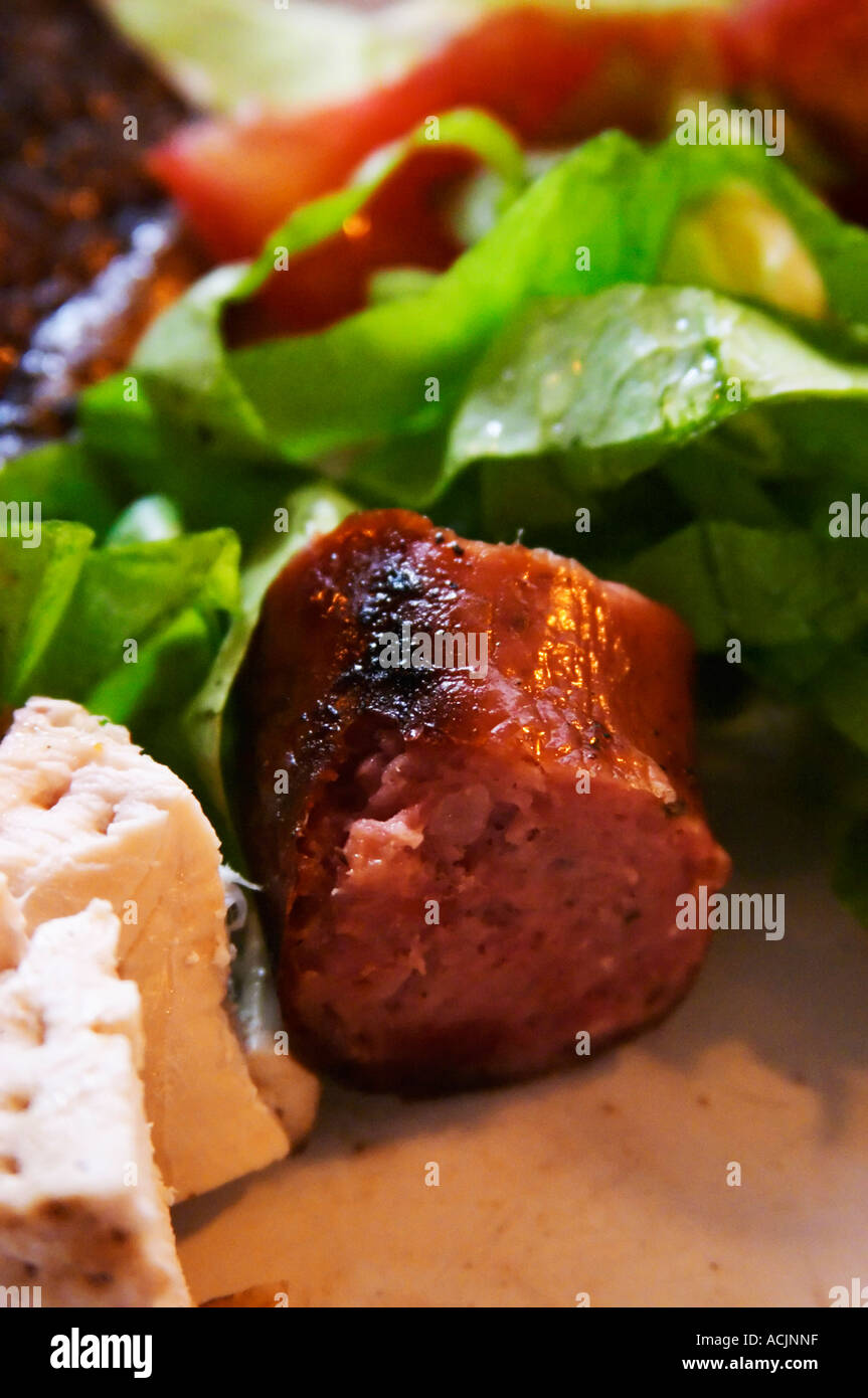 A dish of typical Uruguay barbecue with chicken, pork, beef, sausages