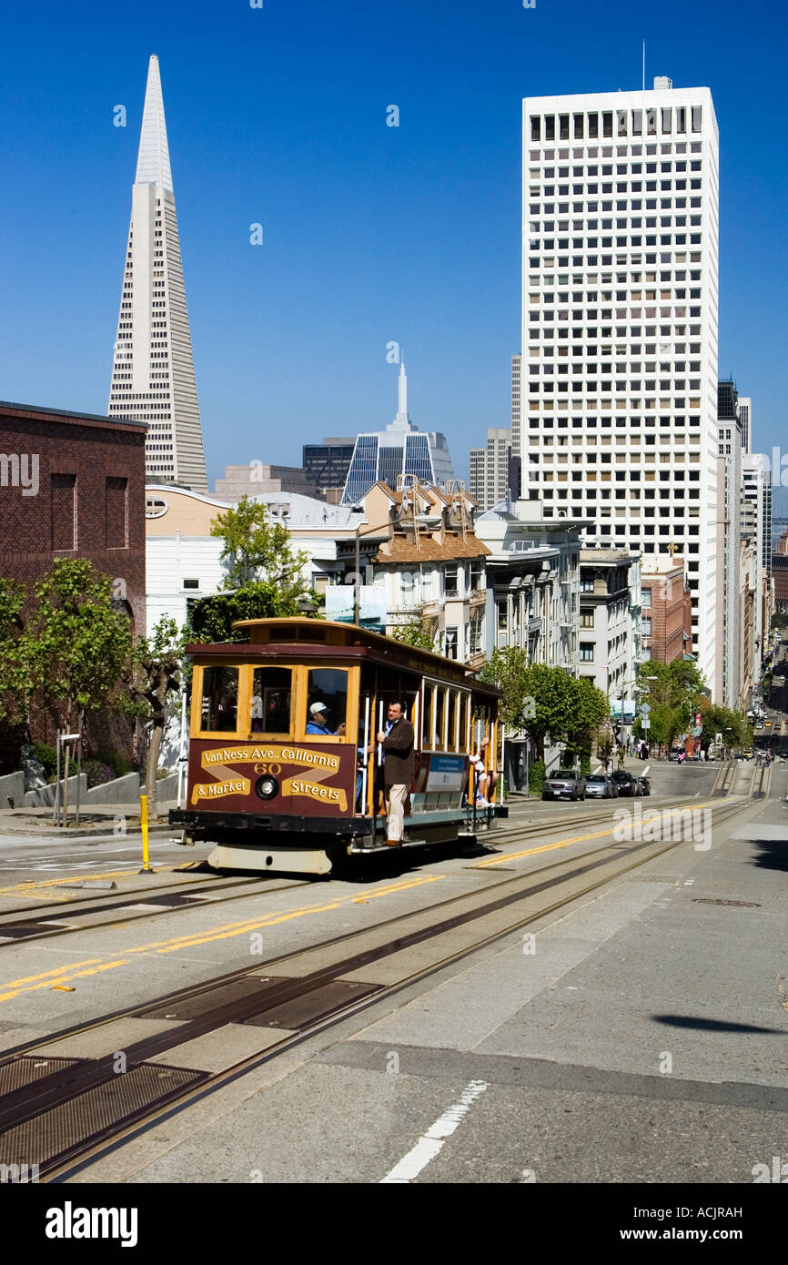 Passengers Ride On A Cable Car in San Francisco California Stock Photo