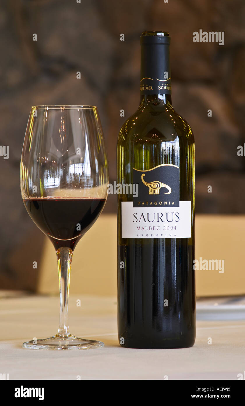 Bottle and glass of Saurus Patagonia Malbec Bodega Familia Schroeder Winery, also called Saurus, Patagonia, Argentina Stock Photo - Alamy