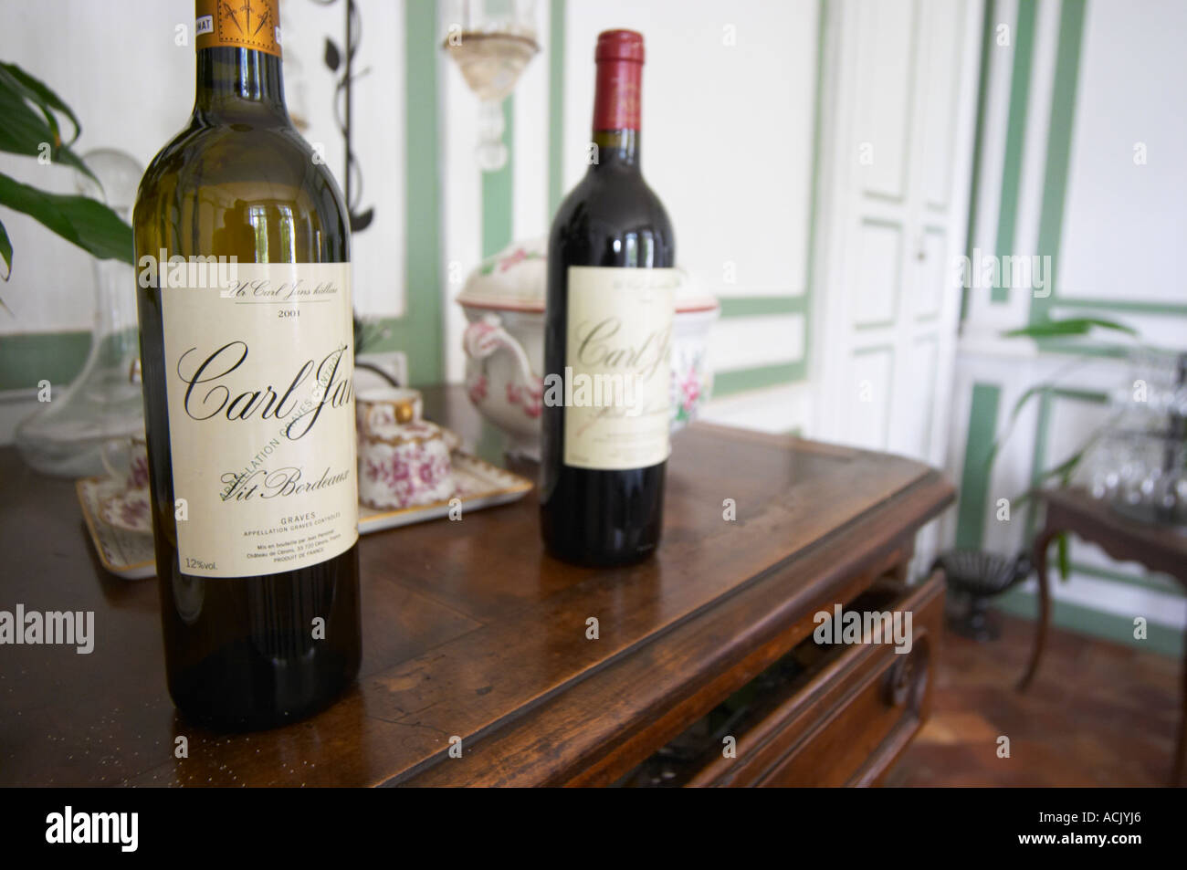 Two bottles of white and red Bordeaux wine labelled Carl Jan Vit and Carl Jan Rod made by the Perromats for the Swedish market Chateau de Cerons (Cérons) Sauternes Gironde Aquitaine France Stock Photo