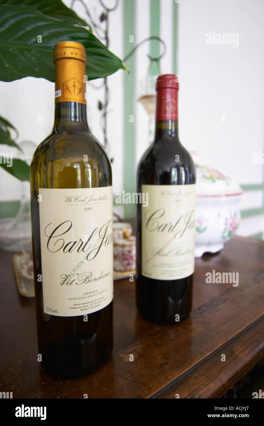 Two bottles of white and red Bordeaux wine labelled Carl Jan Vit and Carl Jan Rod made by the Perromats for the Swedish market Chateau de Cerons (Cérons) Sauternes Gironde Aquitaine France Stock Photo