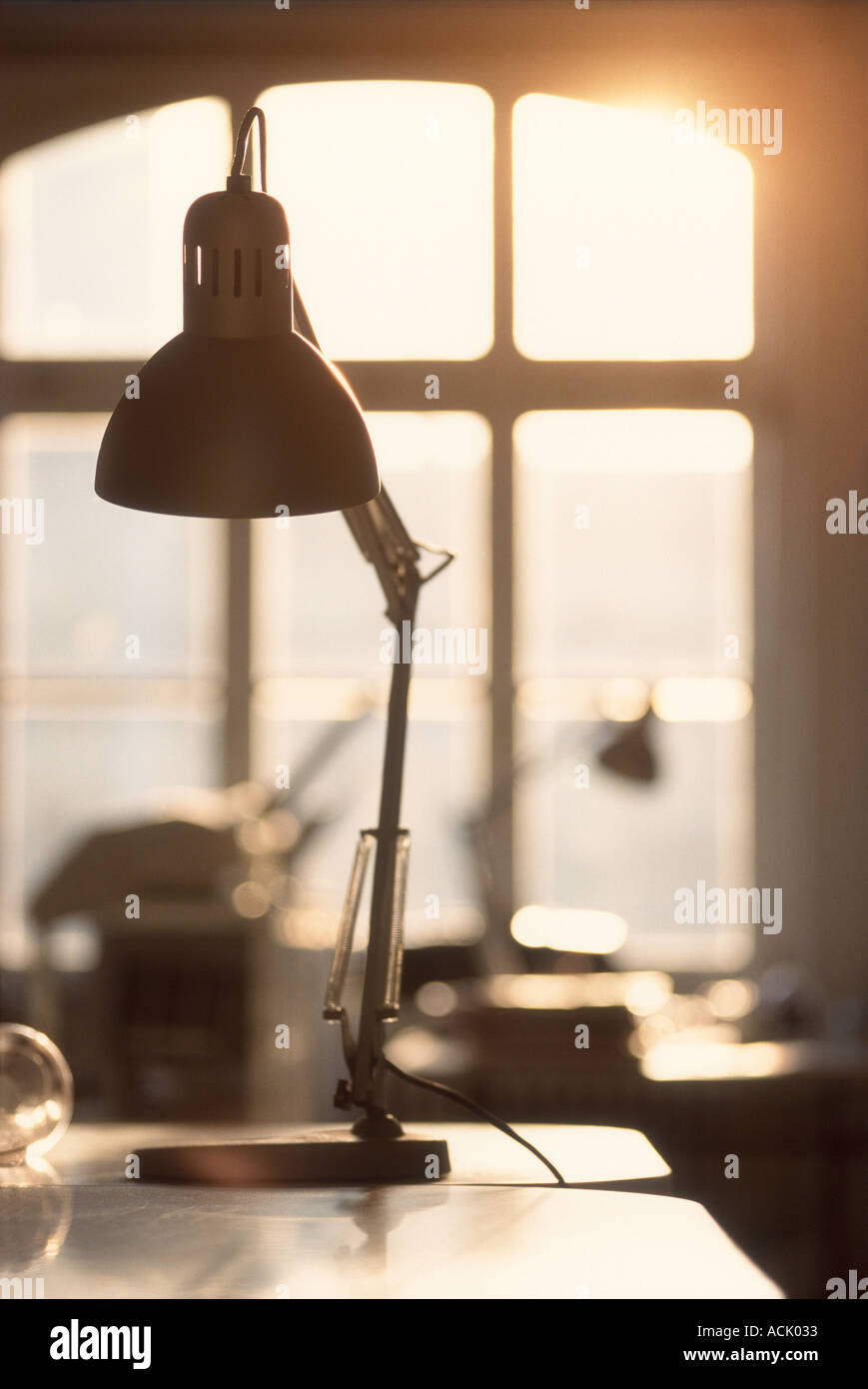 A lamp on a desk Stock Photo