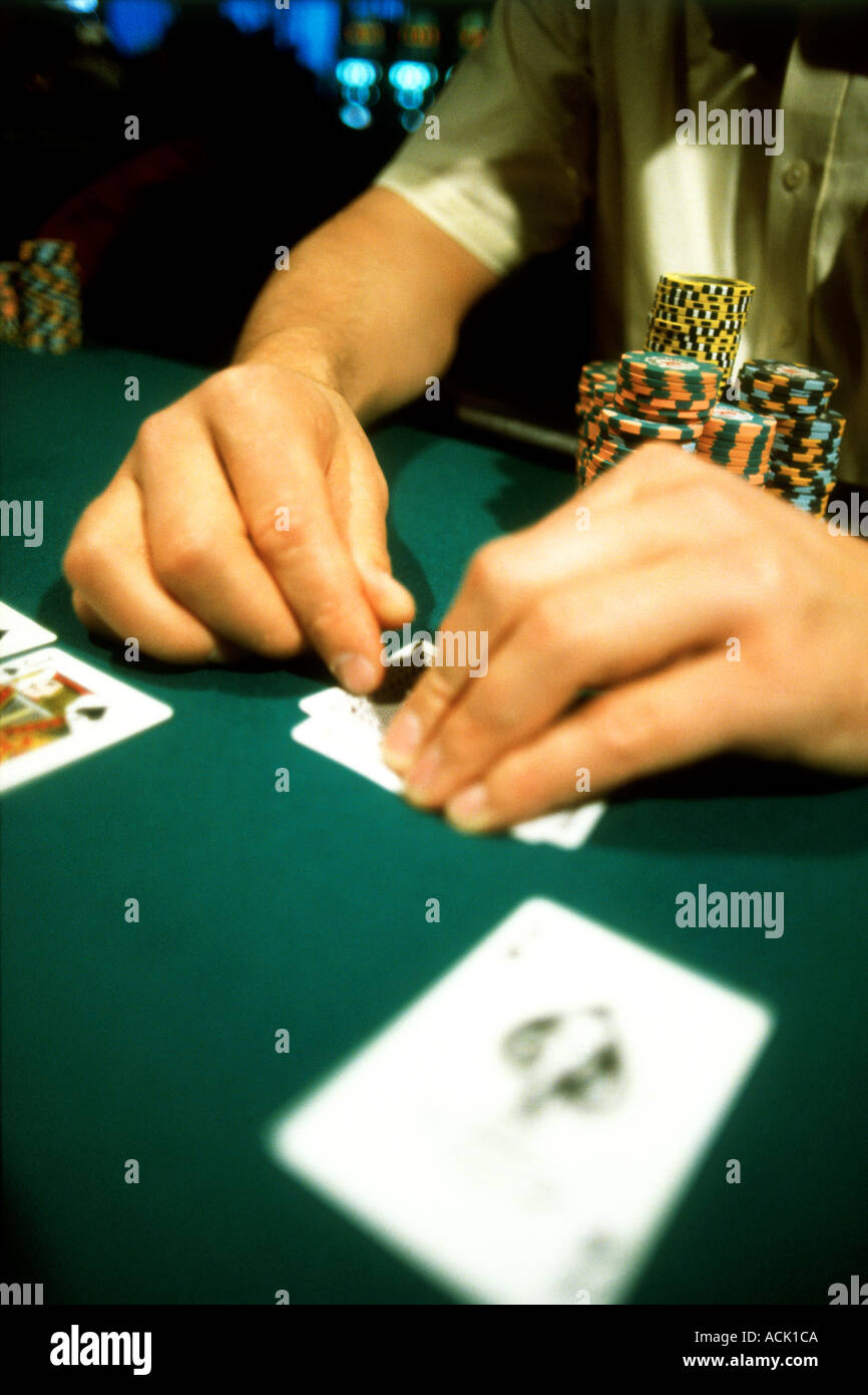 man playing blackjack at a casino Stock Photo