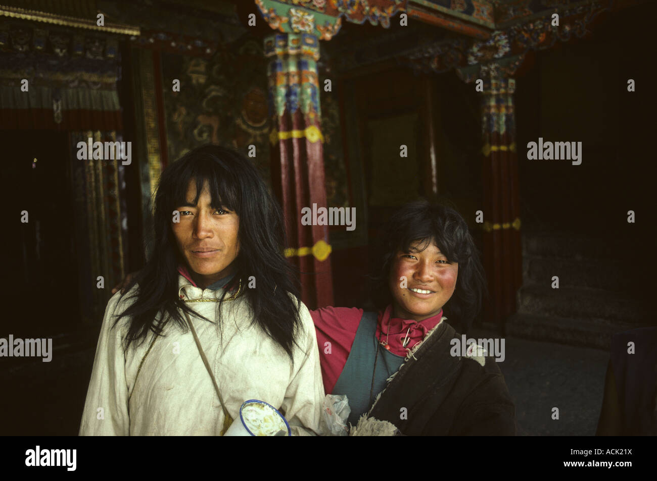 Two Tibetian visitors in Sera monastery, Tibet Stock Photo