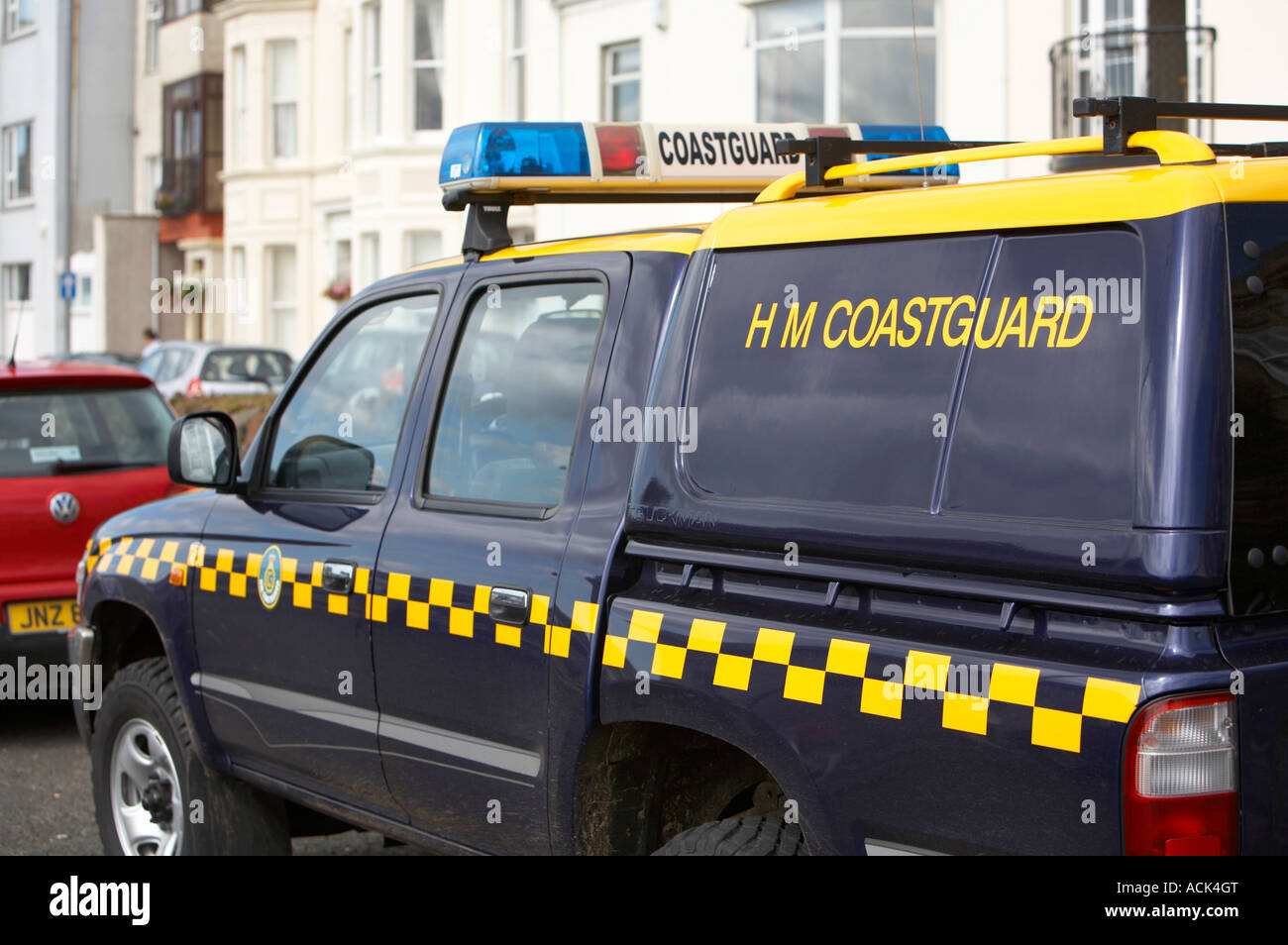 H M Coastguard blue and yellow rescue vehicle parked in Portrush harbour Stock Photo