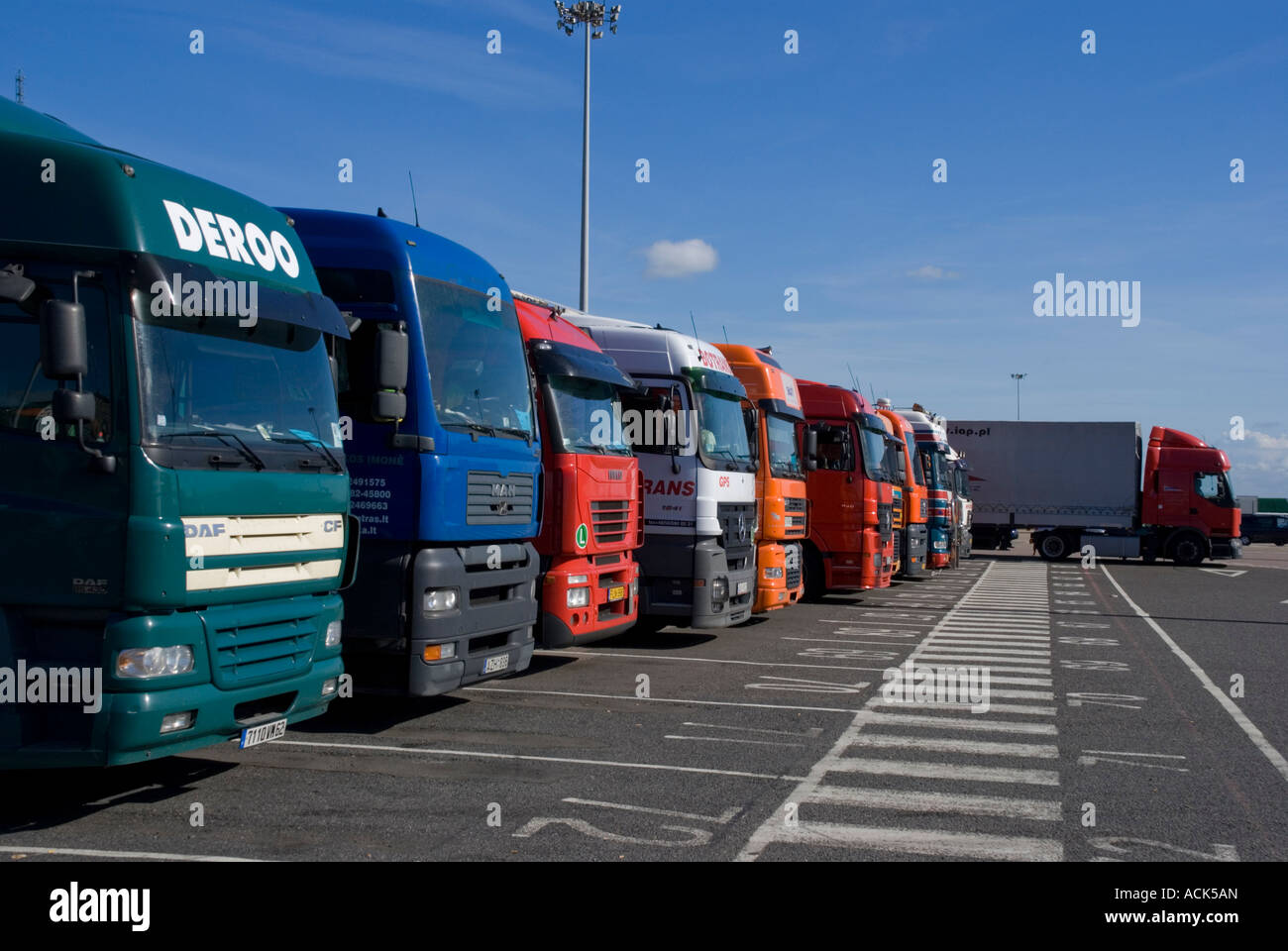 Europe uk dover trucks waiting to board ferry to france port Stock Photo