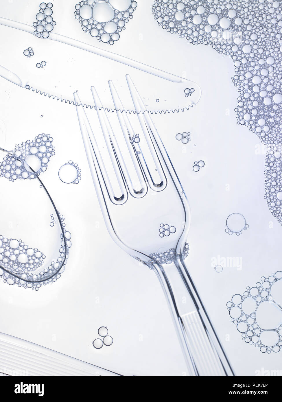 Clear Plastic Fork Knife Spoon In Clean Dish Washer Soap Water With