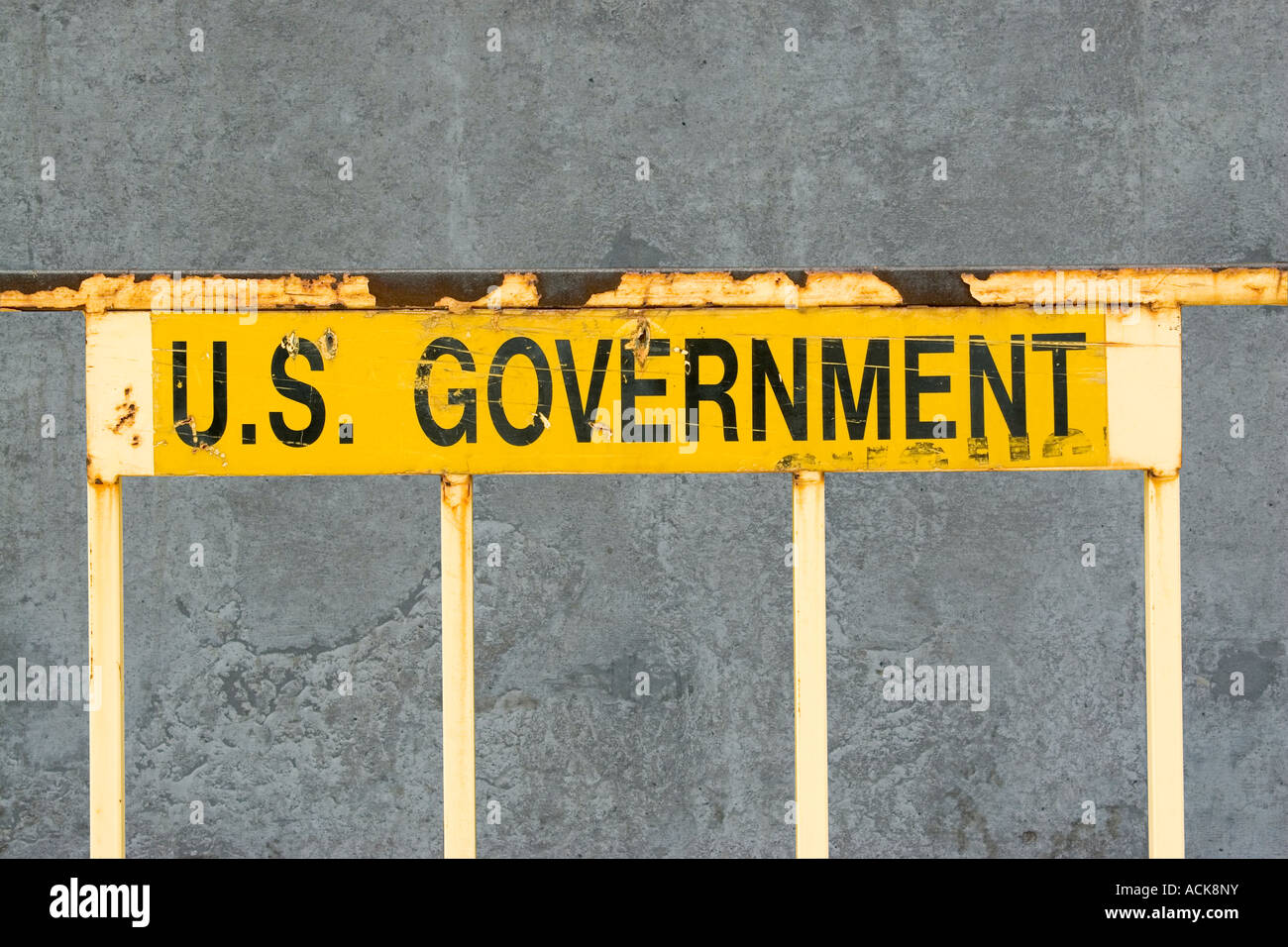 Rusted U.S. GOVERNMENT sign Stock Photo
