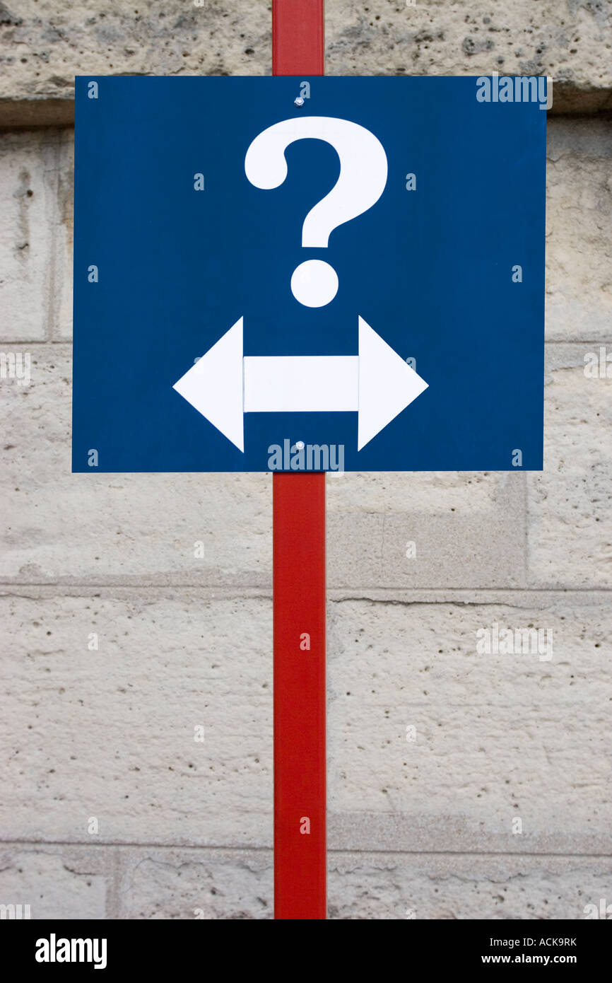 Question mark sign with two-way arrow Stock Photo