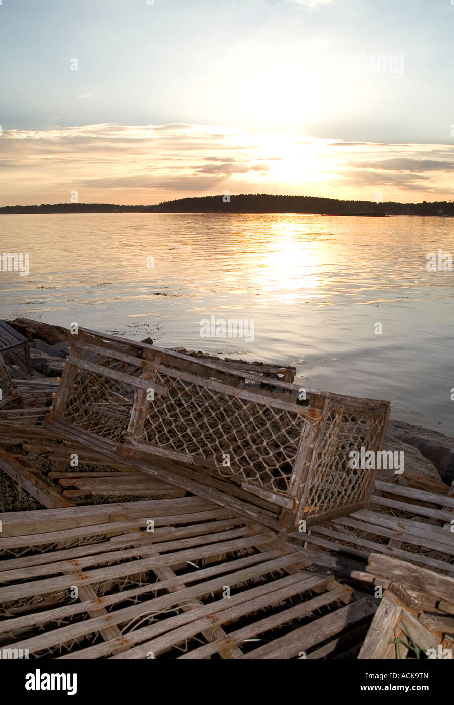 sunset old lobster traps Stock Photo - Alamy