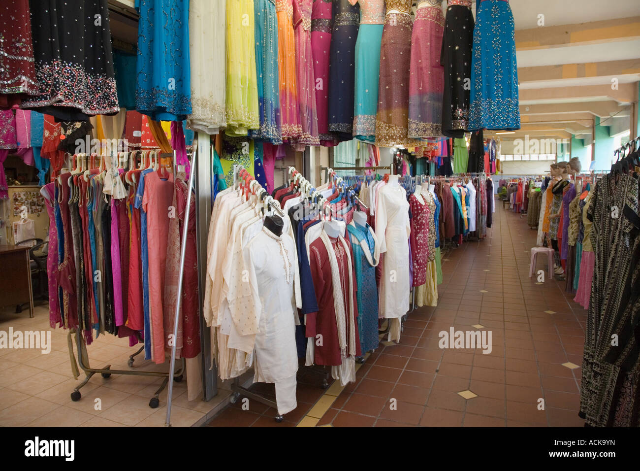 Indian ladies clothing hanging display for sale upstairs in Zhujiao centre market in ethnic neighbourhood of city Little India Singapore Stock Photo