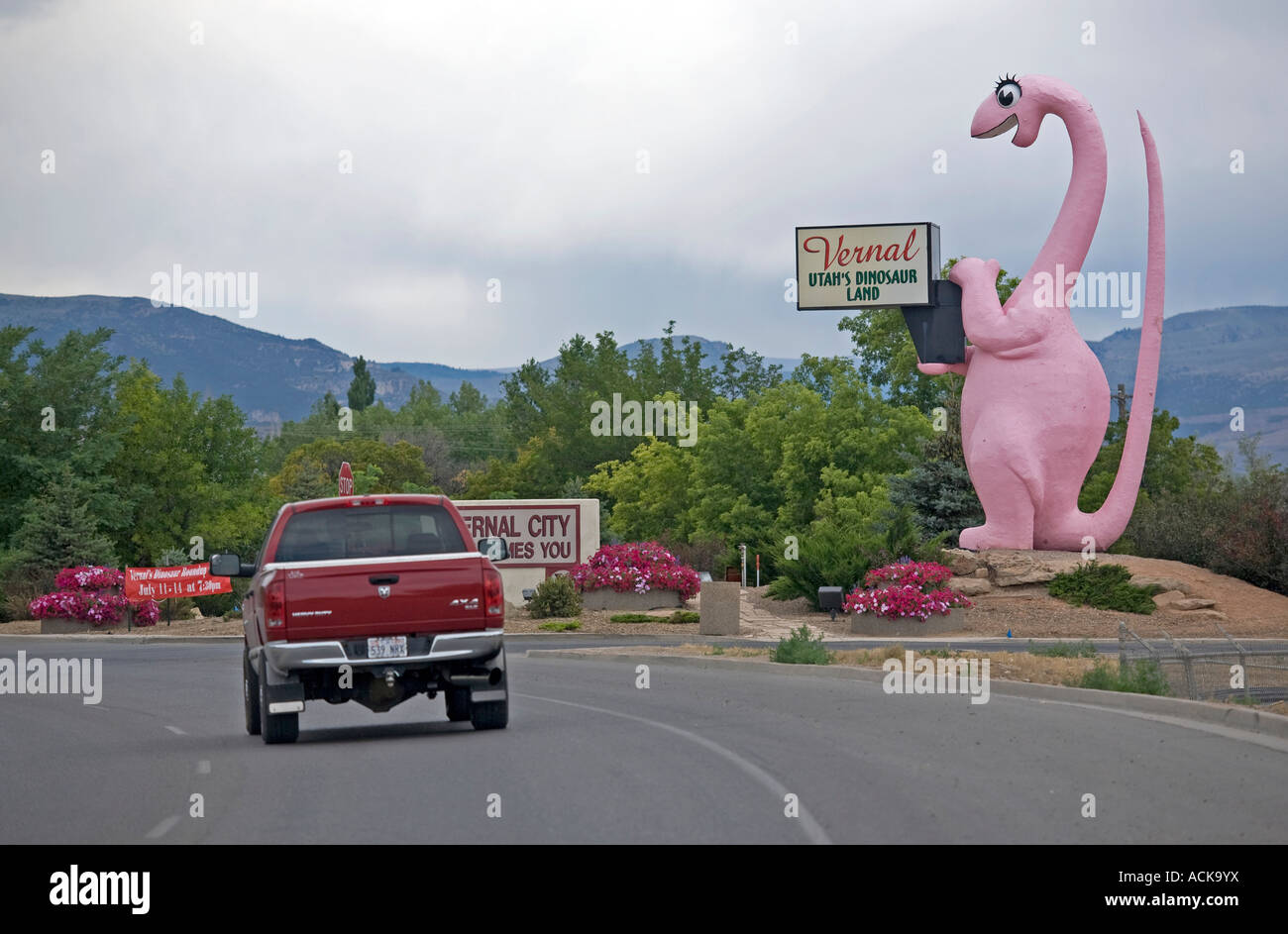 Pink Dinosaur at the entrance of Vernal Utah advertising the area as Dinosaur Land Stock Photo