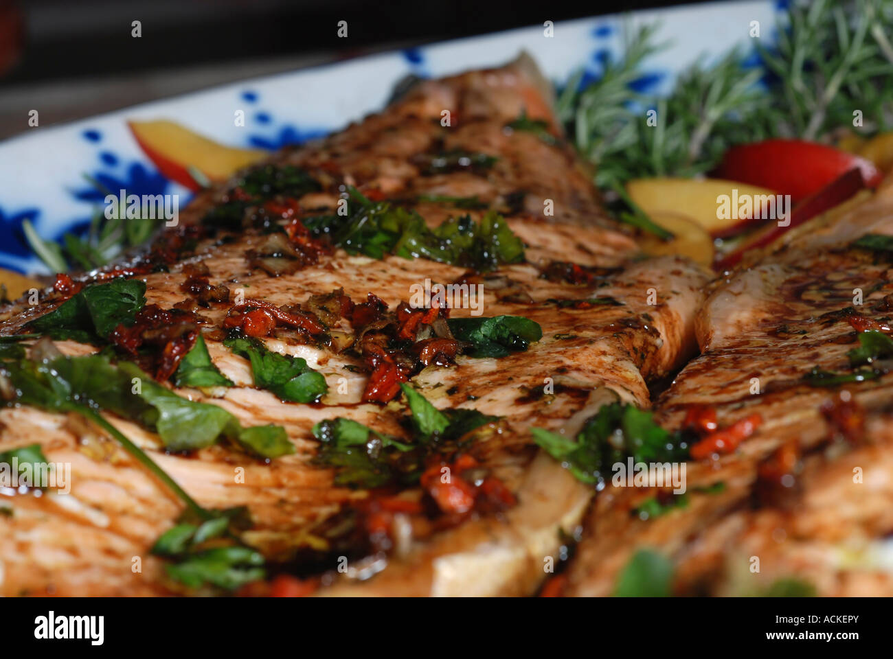 grilled breast of chicken garnished with herbs Stock Photo