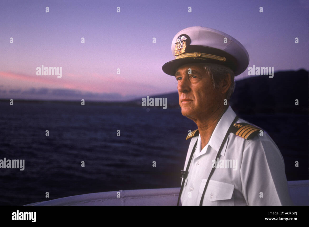 Ships Captain On Boat Bridge At Dawn, Hawaii USA Stock Photo